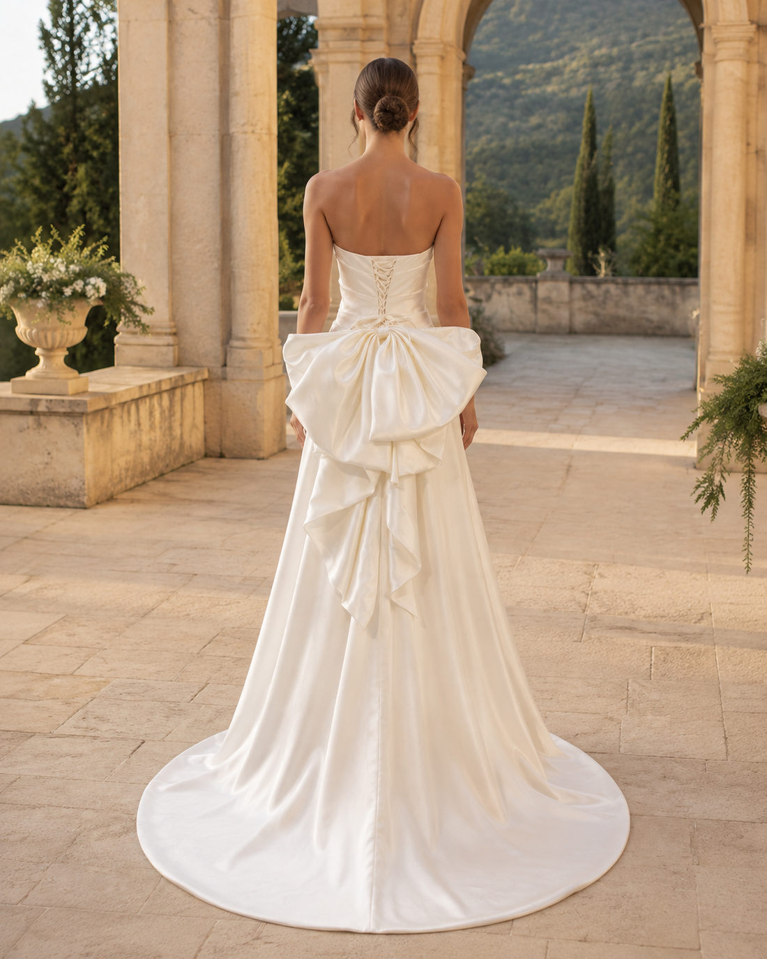 MANT Strapless Draped Satin-Look Back-Bow Column Wedding Dress